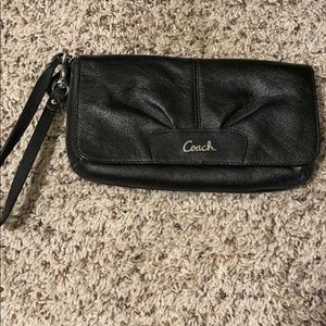 Coach. Black wristlet